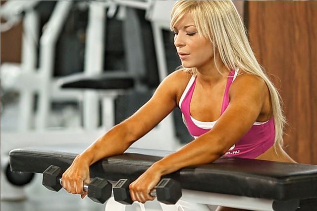 Photo of Palms-Down Dumbbell Wrist Curl Over A Bench exercise