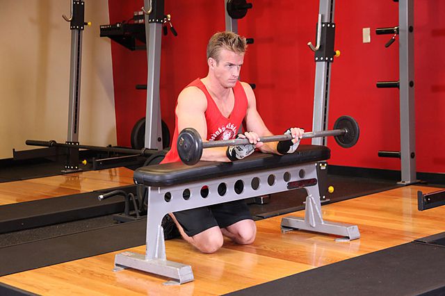 Photo of Palms-Down Wrist Curl Over A Bench exercise