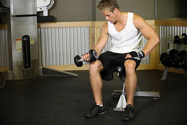 Photo of Seated One-Arm Dumbbell Palms-Down Wrist Curl  exercise