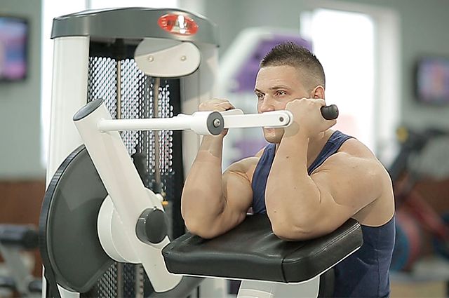 Photo of Machine Preacher Curls exercise