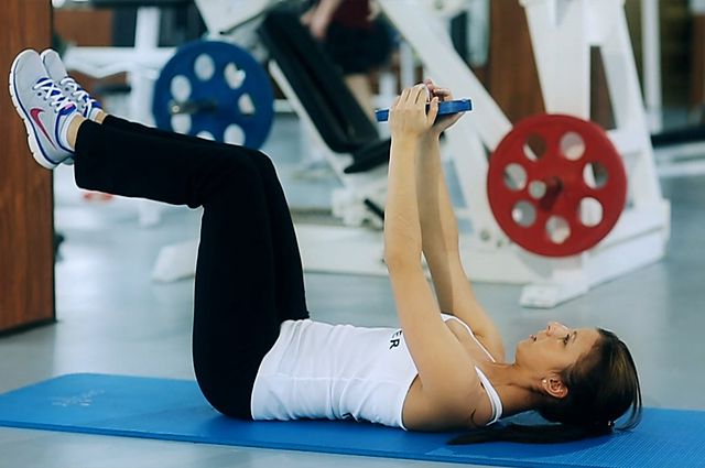 Photo of Weighted Crunches  exercise