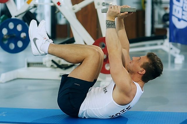 Photo of Weighted Crunches  exercise