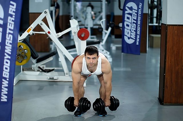 Photo of Stiff-Legged Dumbbell Deadlift  exercise