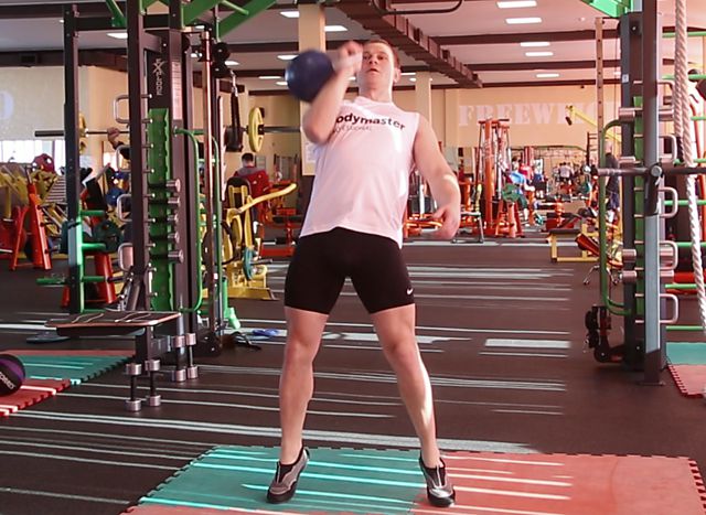 Photo of One-Arm Kettlebell Jerk exercise
