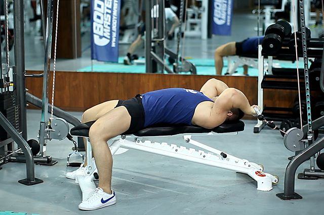 Photo of Cable Lying Triceps Extension exercise