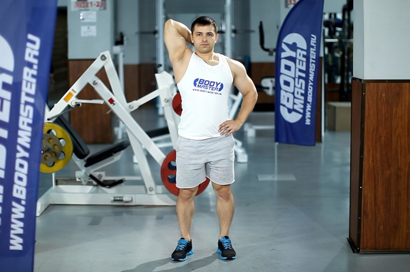 Exercise Standing One-Arm Dumbbell Triceps Extension