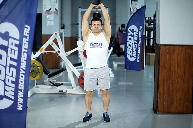 Photo of Standing Dumbbell Triceps Extension exercise