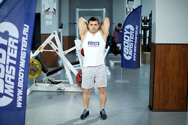 Photo of Standing Dumbbell Triceps Extension exercise