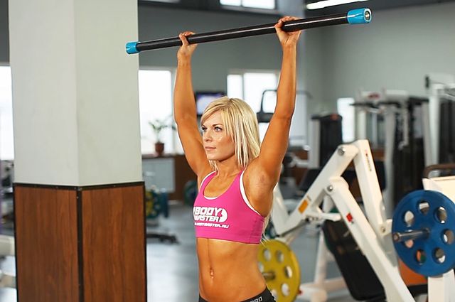 Photo of Standing Front Barbell Raise Over Head  exercise