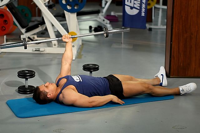Photo of One Arm Floor Press  exercise