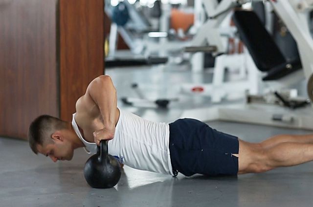 Photo of Plyo Kettlebell Pushups  exercise
