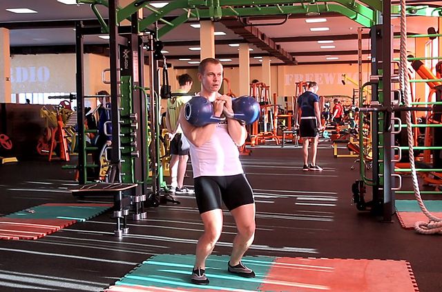 Photo of Double Kettlebell Jerk exercise