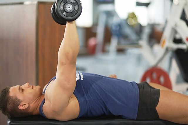 Photo of One Arm Dumbbell Bench Press exercise