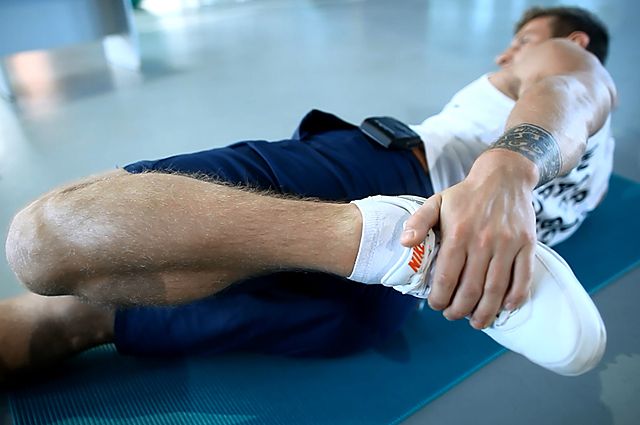 Photo of On Your Side Quad Stretch exercise