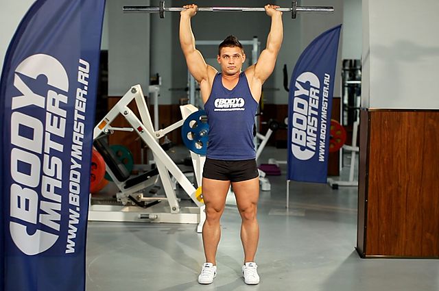Photo of Standing Barbell Press Behind Neck  exercise