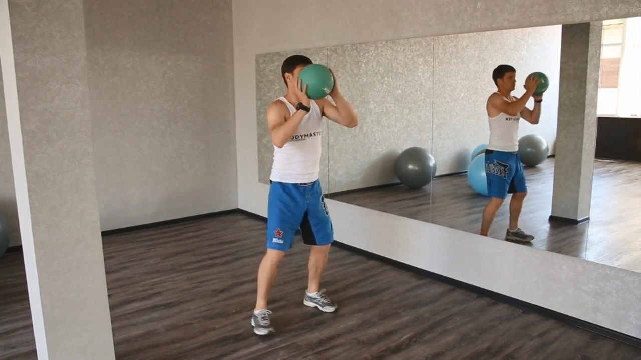 Exercise Standing Two-Arm Overhead Throw