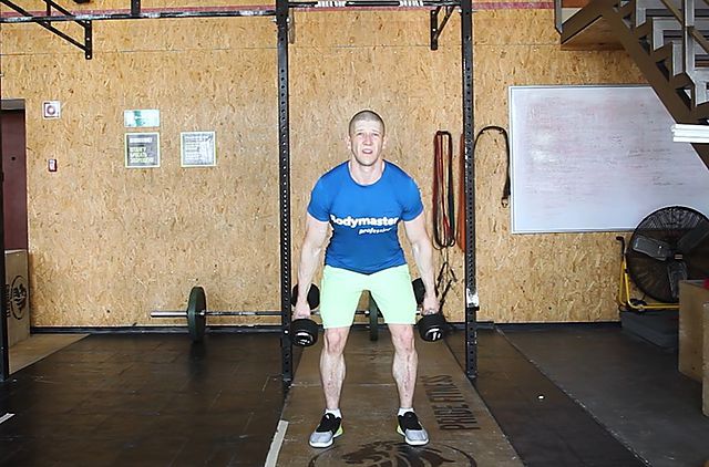 Photo of The Dumbbell Hang Clean exercise