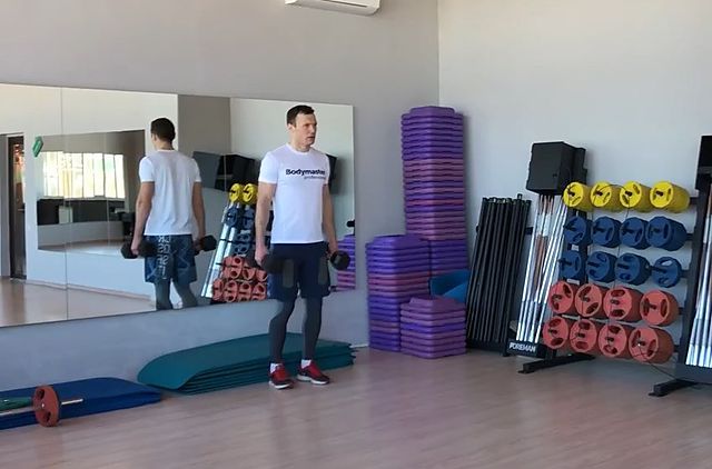 Photo of Dumbbell Walking Lunge exercise