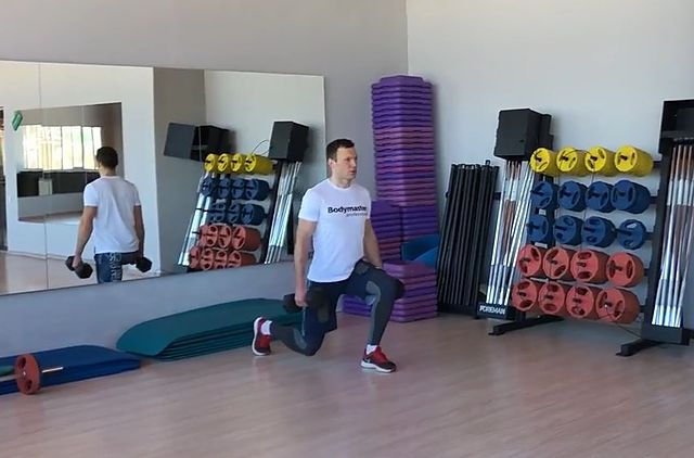 Photo of Dumbbell Walking Lunge exercise