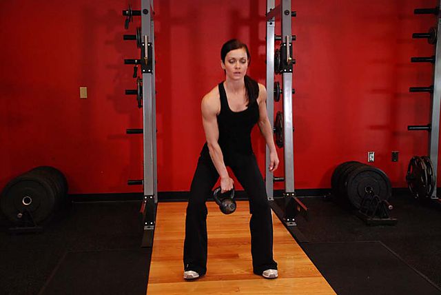 Photo of One-Arm Open Palm Kettlebell Clean exercise