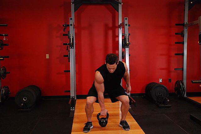 Photo of One-Arm Open Palm Kettlebell Clean exercise