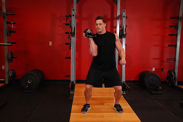 Photo of One-Arm Open Palm Kettlebell Clean exercise
