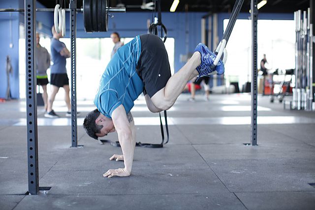 Photo of Suspended Reverse Crunch exercise
