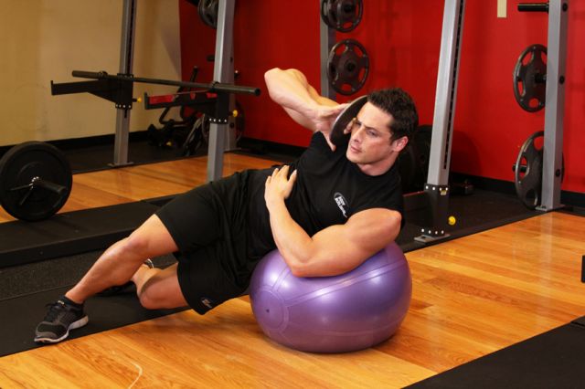 Photo of Weighted Ball Side Bend exercise
