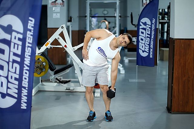 Photo of Dumbbell Side Bend exercise