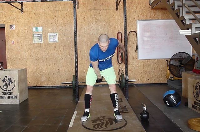 Photo of One-Arm Kettlebell Clean exercise